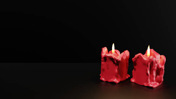 3D render of red burning candles on a black background. Empty space for text. Background for Christmas and Halloween designs. Old candles burn on a light background. Day of Remembrance of the Dead.