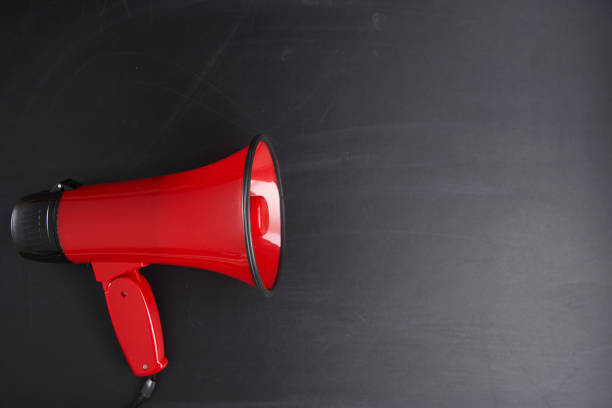 istock red megaphone on the chalkboard 1410427300