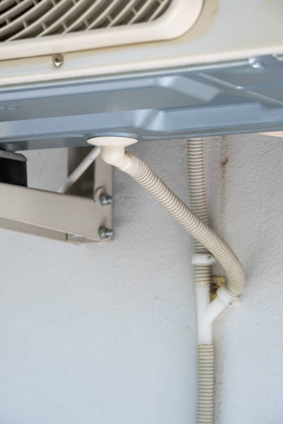 istock air conditioner drain hose on wall 1410433973