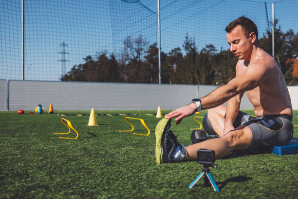 istock Athlete stretching his muscles 1410433978