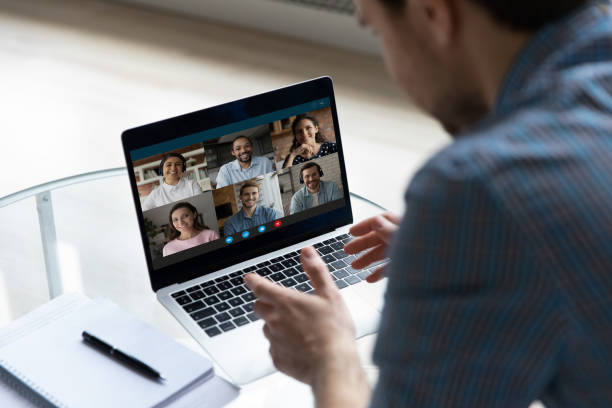 istock Concentrated young businessman holding video conference call. 1410435029