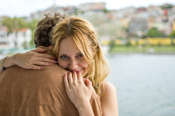 Shot of a happy young couple spending the day at the beach.
