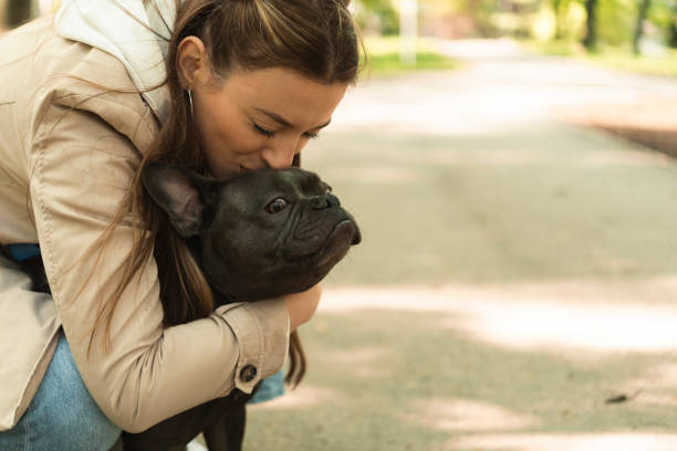 istock Young woman with dog 1410436209