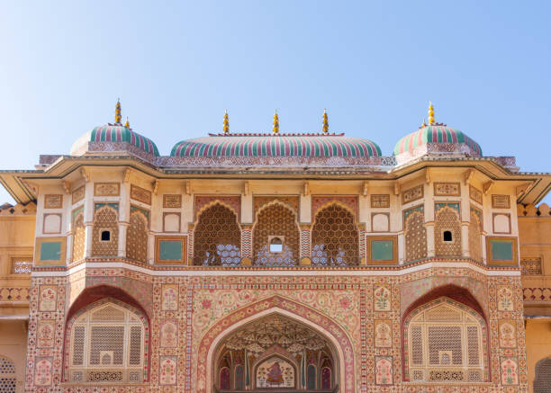 The gateway in to the Amber Fort in Jaipur, India A view of the detailed gateway in the Amber Fort, Jaipur, Rajasthan, India. amber fort stock pictures, royalty-free photos & images