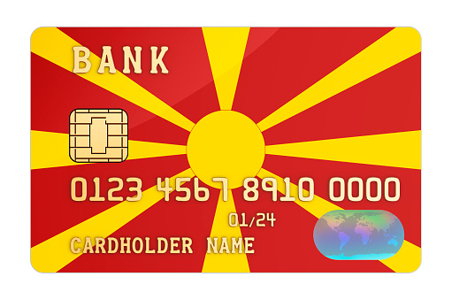 Bank credit card featuring Macedonian flag. National banking system in Macedonia concept. 3D rendering isolated on white background