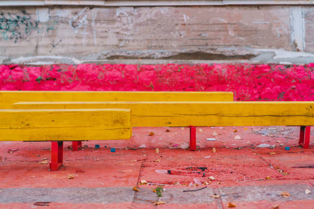 Multicoloured wooden Bench in a public park