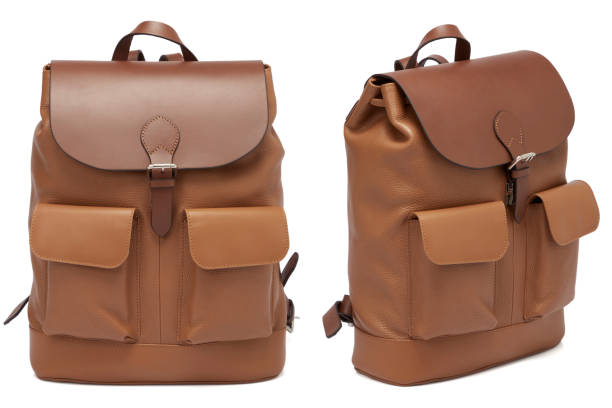 istock Brown Black Leather Backpak On White Background 1410446235