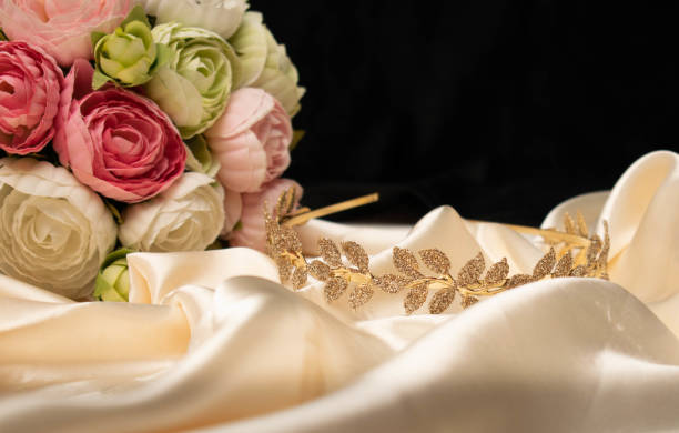 istock gold crown on  a bed of satin, with copyspace 1410448962