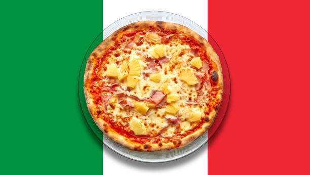 istock Italian flagged  Table with Hawai pizza. 1410452089