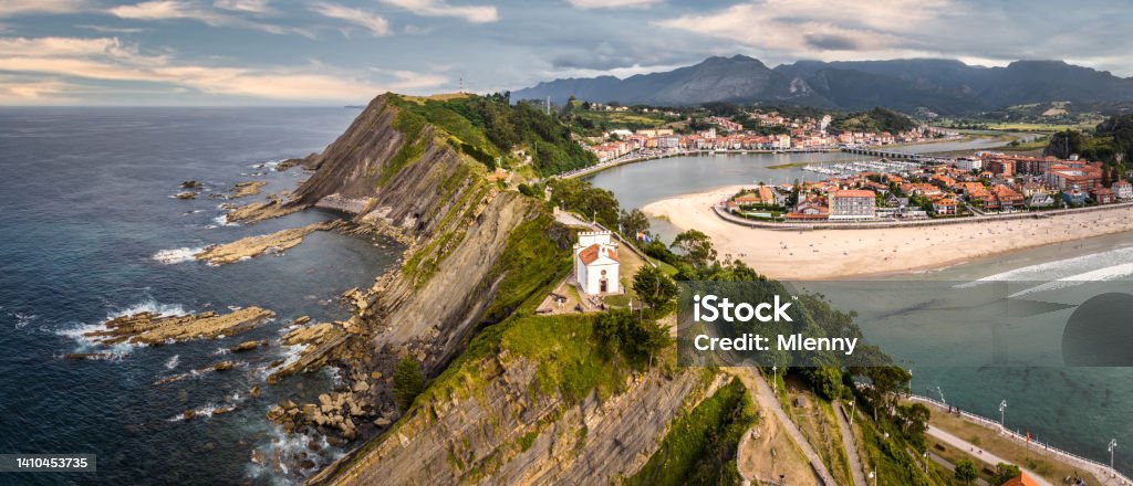 Ribadesella Beach and Town Panorama View Asturias Spain Ribadesella - Ribeseya Beach and Town Aerial Drone Point of View Panorama overlooking the coastal cliffs towards the beach and town.
Ribadesella, Asturias, Spain, Europe. Spain Stock Photo