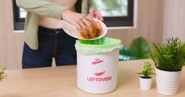 istock woman scraping rotten vegetable 1410453852