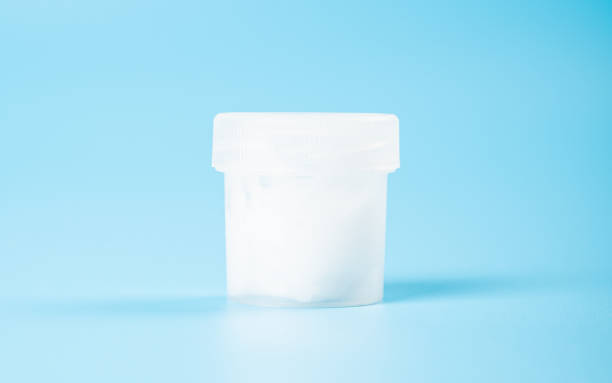 istock sperm donation concept, a test tube with a clear liquid  on a blue background 1410457699