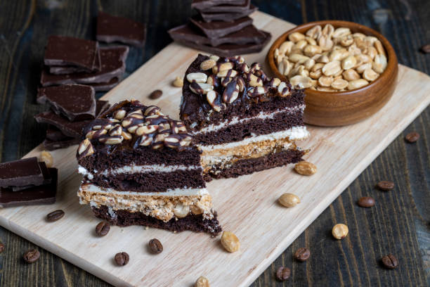 chocolate cake with nut filling and peanuts