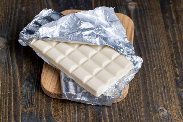 istock white porous chocolate on a wooden table 1410461179