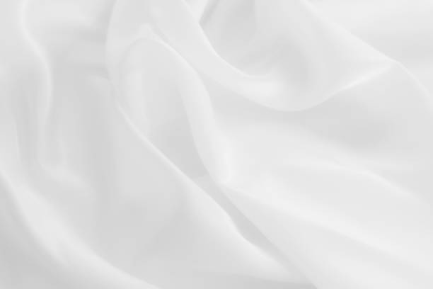 istock White cloth background abstract with soft waves, closeup texture of cloth 1410462410