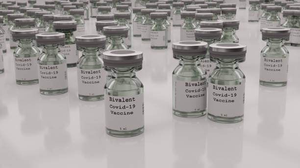 Bivalent Covid19 Vaccine Collection of Covid19 bivalent vaccine vials booster dose stock pictures, royalty-free photos & images