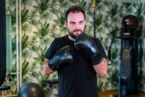 fitness trainer is trainning to boxing series stock photo