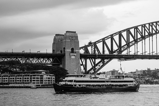 Sydney, Australia - January 26, 2008: The Sydney Opera House with the Harbor Bridge in the background.