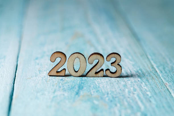 istock The year 2023 in large numbers on a blue background. Elements for calendar design. 1410472170