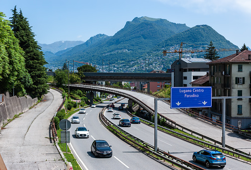 Lugano, Switzerland - June 4, 2022: Traffic on the main road leading to Lugano, Switzerland