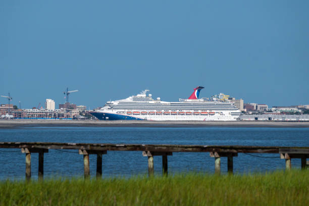 Carnival Sunshine Charleston, SC, USA - July 23, 2022: Sunshine, a 272-meter passenger ship owned by Carnival Cruise Line and flagged to Bahamas, moored at the port of Charleston. carnival sunshine stock pictures, royalty-free photos & images