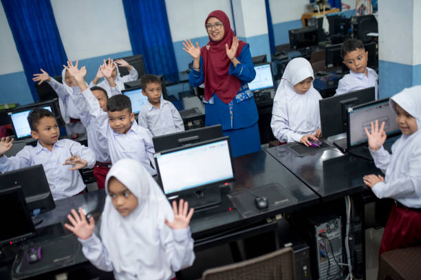 istock Take a picture after studying in the computer lab 1410479379