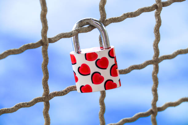 Love padlock with small red hearts stock photo