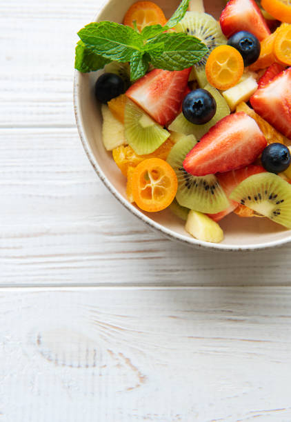 istock Healthy fresh fruit salad in a bowl 1410487153