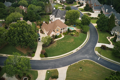 Aerial panoramic view of house cluster in a sub division in Suburbs in Georgia ,USA shot by drone shot during an overcast sky.
