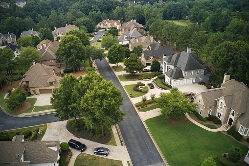 Aerial panoramic view of house cluster in a sub division in Suburbs in Georgia ,USA shot by drone shot during an overcast sky.