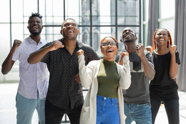 istock Successful and confident african business team celebrating win 1410495819