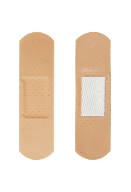istock Two sides of a single bandage. Plaster isolated on white background 1410501059