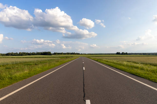 istock paved road for car traffic 1410505123