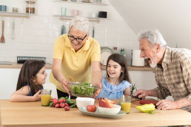 istock Multi-generation family preparing food at home 1410506143