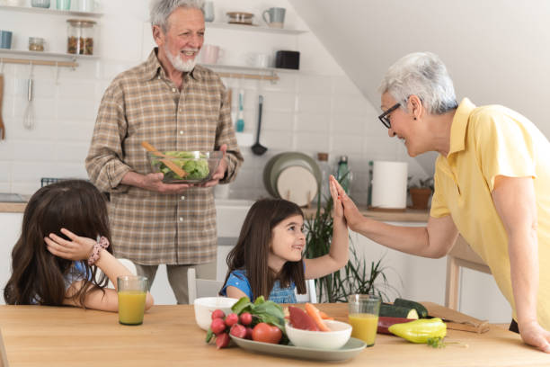 istock Multi-generation family preparing food at home 1410506163