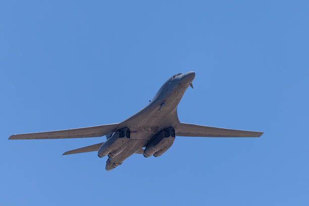 Frontal view of a B-1 Lancer bomber in beautiful light Frontal view of a B-1 Lancer bomber in beautiful light b1 bomber stock pictures, royalty-free photos & images
