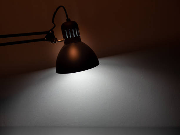 istock Table gray lamp on a gray background. 1410508072