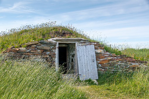 The door to a root cellar is invitingly open in the small town of Elliston on the Bonavista Peninsula, Newfoundland.