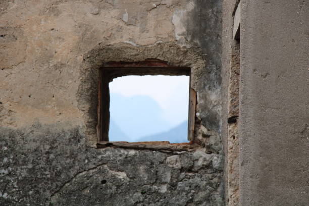 istock Lake Garda mountain range through a window in a castle 1410512633