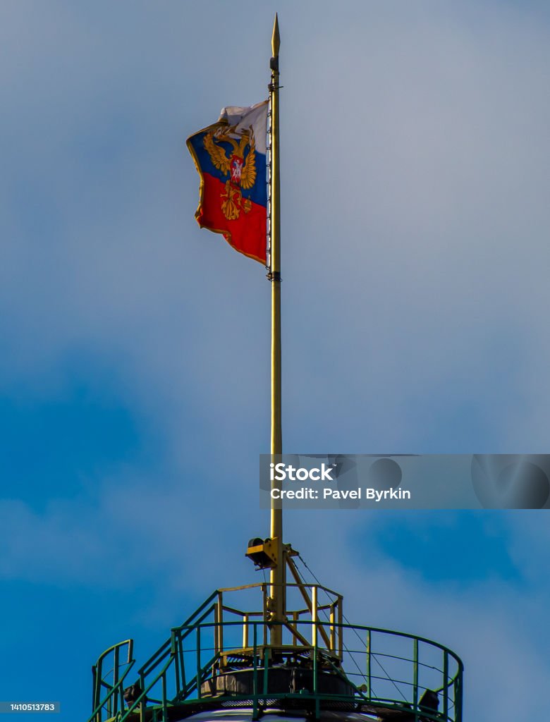 sights of the Russian capital The Russian flag over the dome of the Senate Palace in the Moscow Kremlin. Architectural Dome Stock Photo