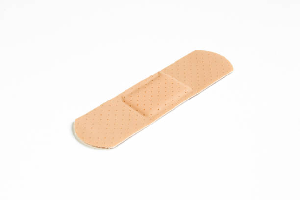 istock Plaster isolated on white background. Orange Bandage protection 1410513787