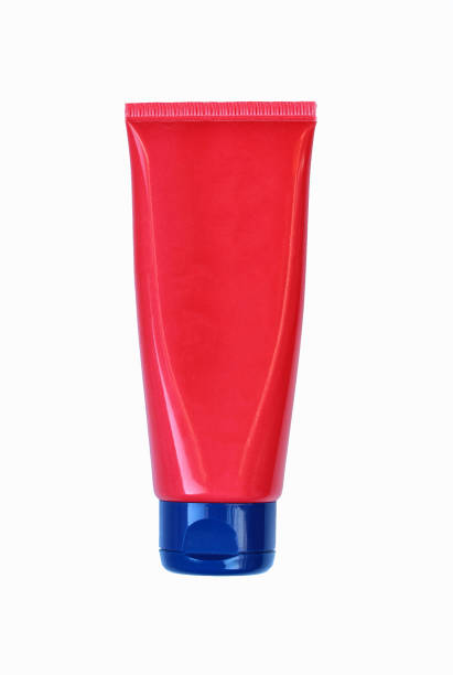 istock Red plastic packaging isolated on white background. Blank cream tube 1410519284