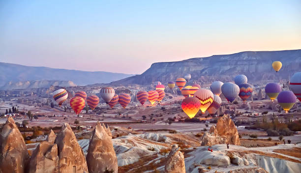 Panoramic landscape hot air balloons in Cappadocia, Turkey stock photo