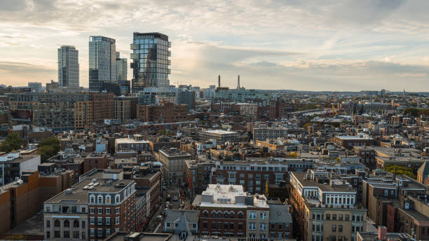 istock Modern Condos and office buildings constructions in Boston, MA - distant view over residential district. 1410522464