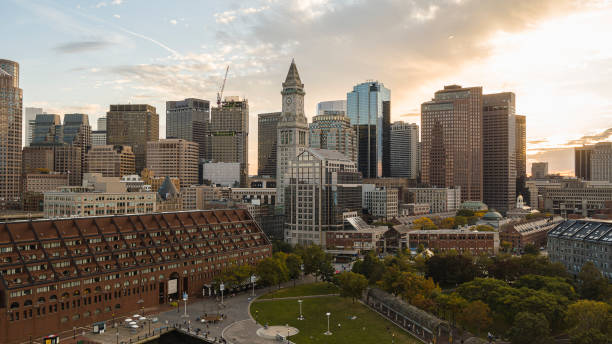 istock Boston city evening skyline with Financial district view over Trellis at Christopher Columbus Park. 1410522470