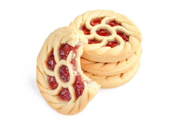 istock Tarts with cherry jam. Small crusty pies isolated on white background. One bitten 1410524252