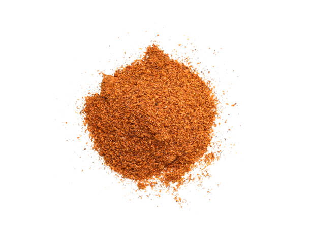 istock Red pepper powder isolated on white background. Dry and grinded 1410525213