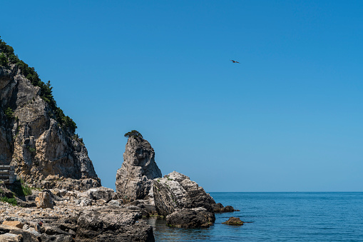 View of the Black Sea coast and steep rocky landforms