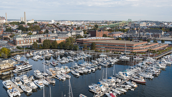 Aerial top view of camping and marina with boats in harbour from above, North Holland, Netherlands