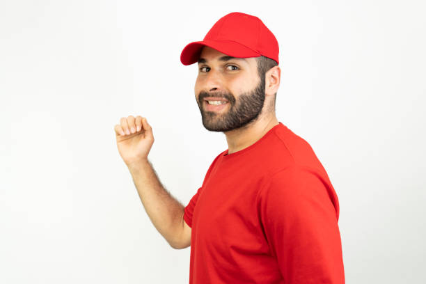 istock portrait of young middle eastern man wearing hat, isolated white background 1410530190